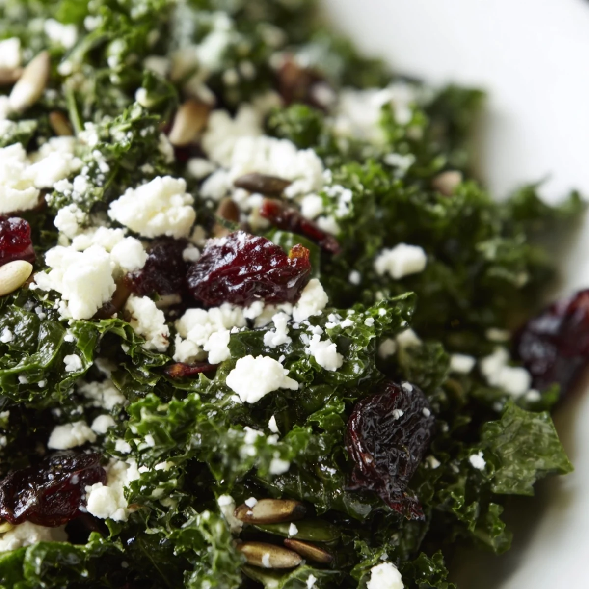 Freshly massaged kale topped with sweet dried cranberries, pumpkin seeds, and sunflower seeds for a crunchy bite.