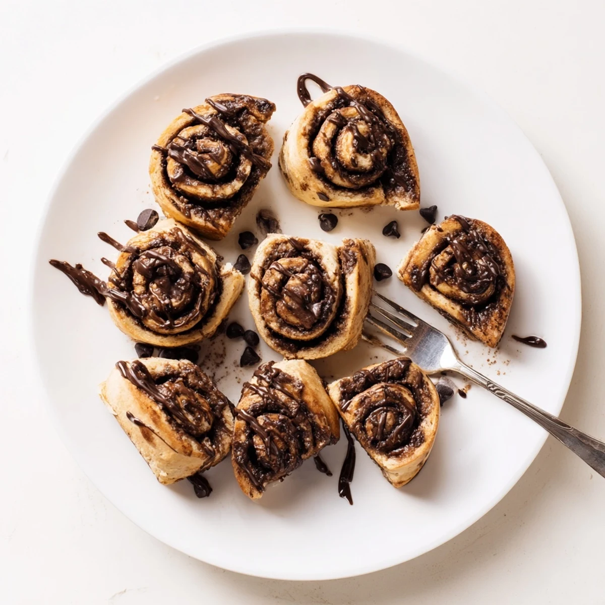 Soft double chocolate cinnamon rolls swirled with rich cocoa cinnamon filling and chocolate chips